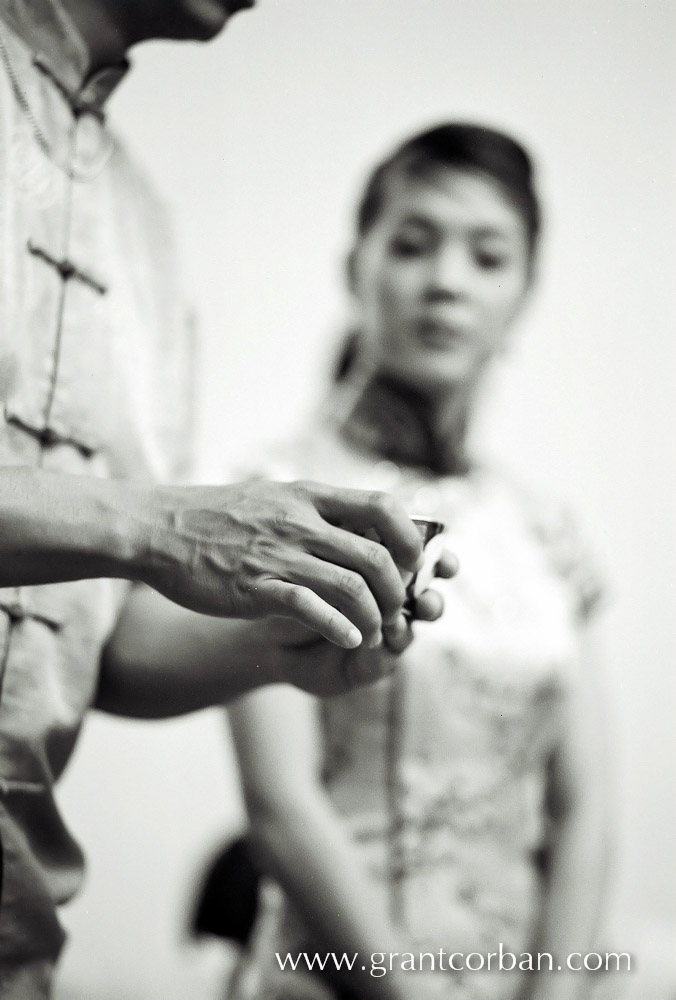 chinese tea ceremony wedding photographed with ilford black and white film at Carcosa Seri Negara Kuala Lumpur