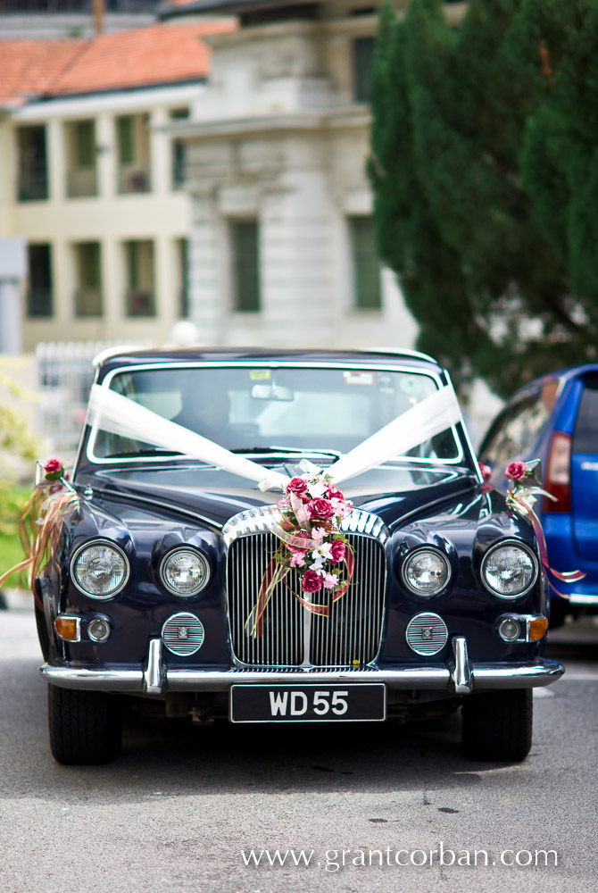 Classic wedding car outside St Johns Cathedral