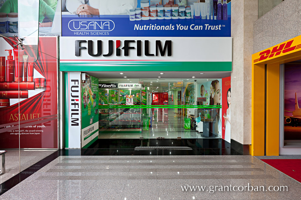 Square on view of the Fujifilm show room entrance in Menara Axis