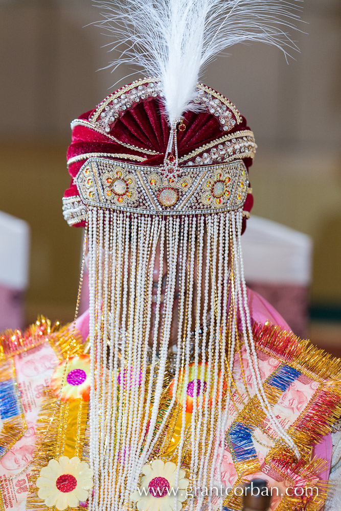 punjabi groom wearing sehra at wedding