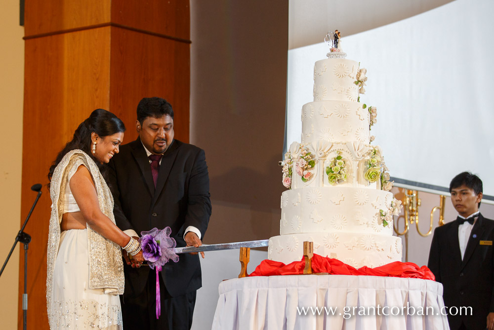 cutting cake at Wedding dinner at the Allson Klana Resort Seremban