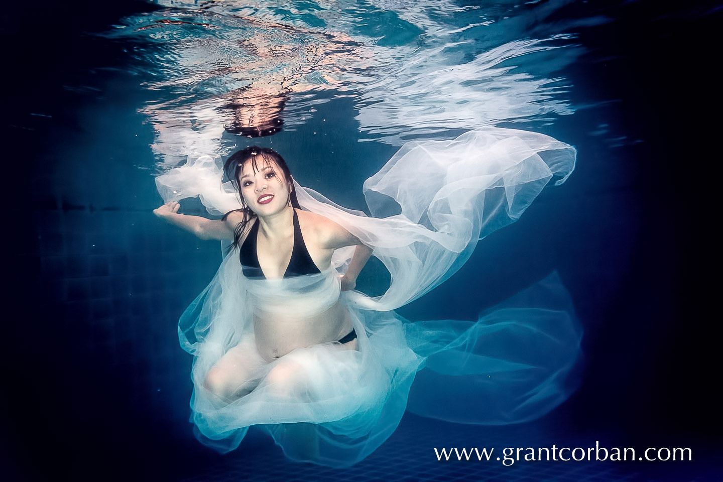 underwater pool pregnancy portrait photography in kuala lumpur